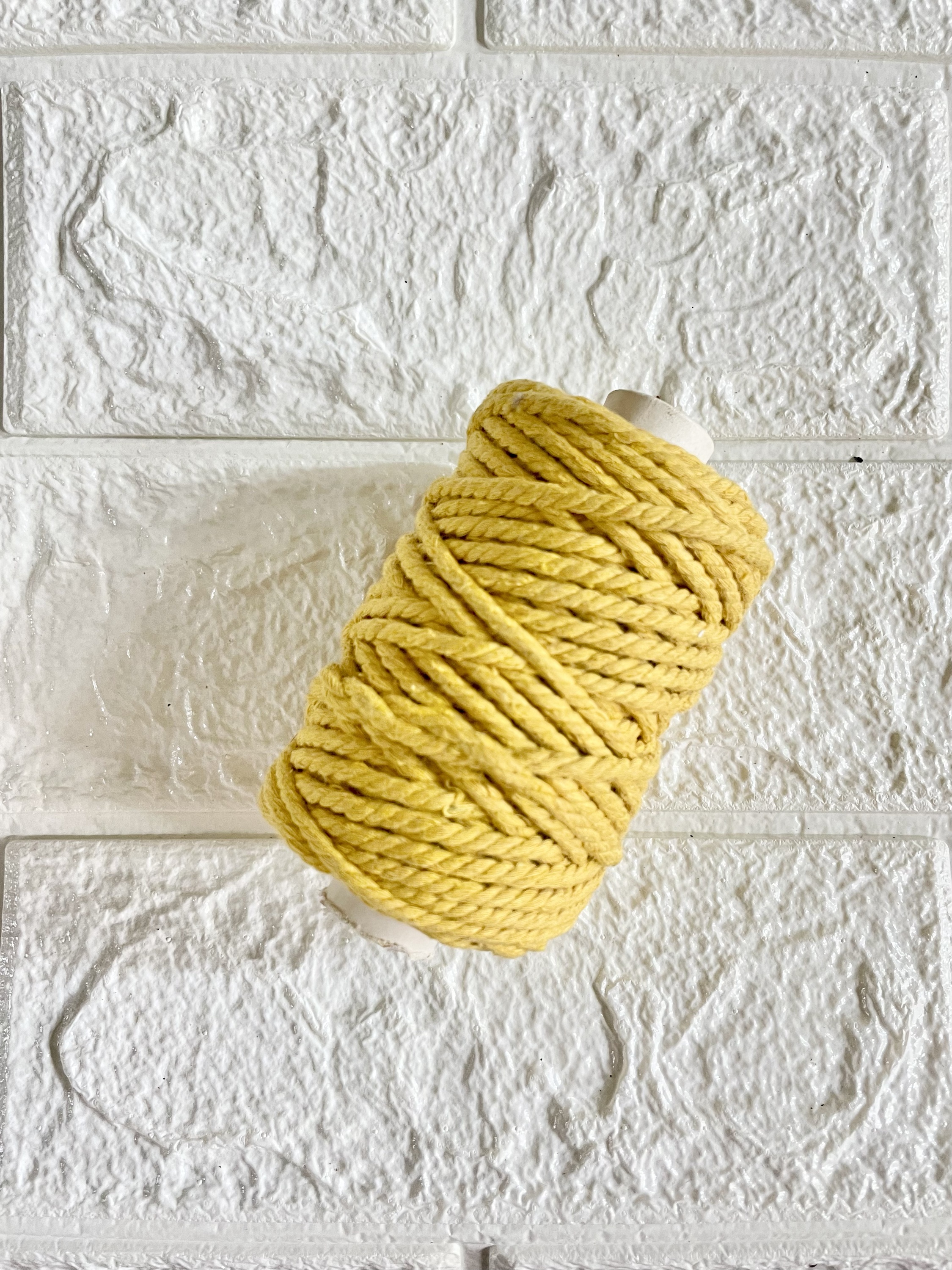 Yellow macrame thread