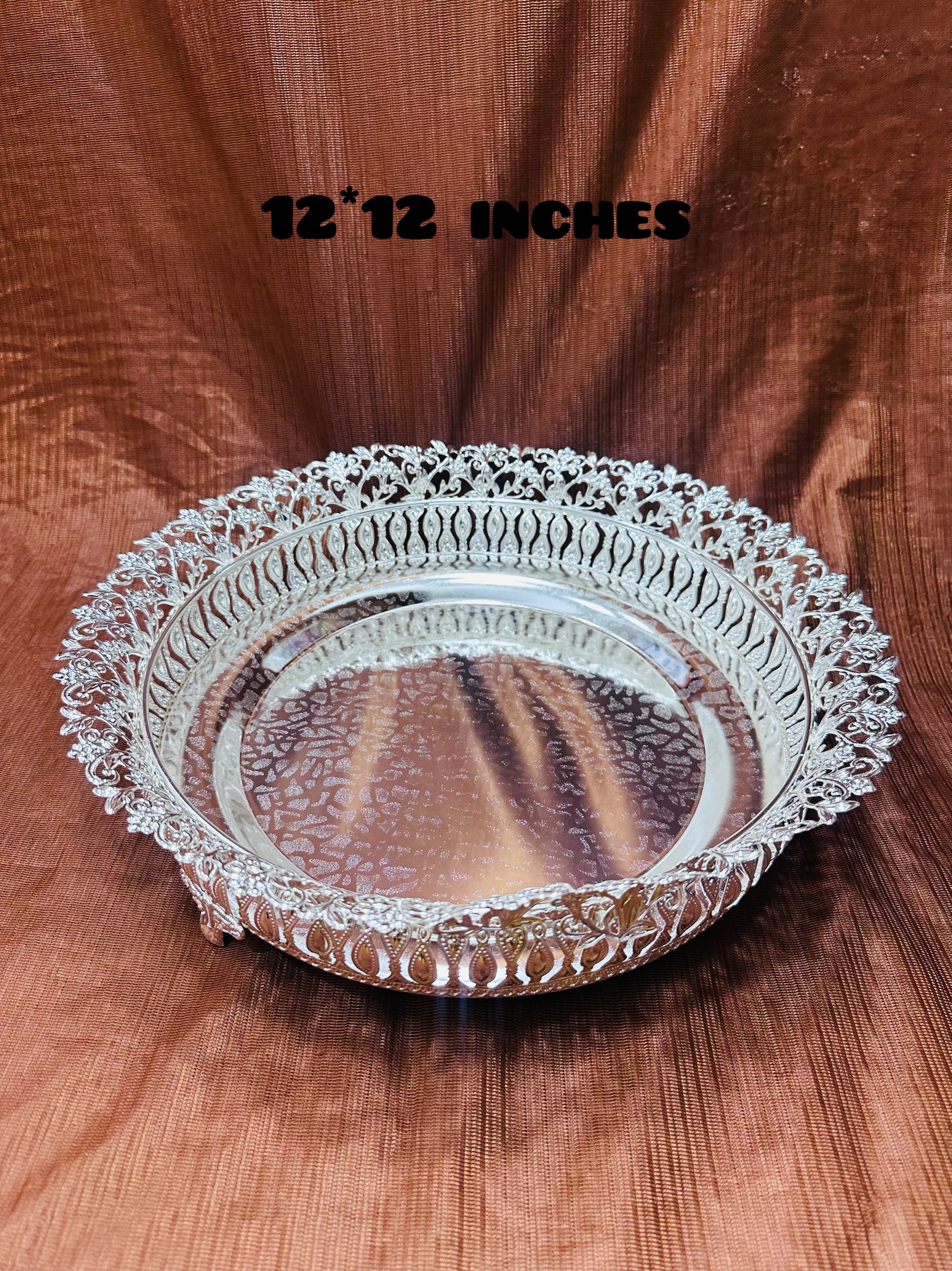 Round with design German silver plate